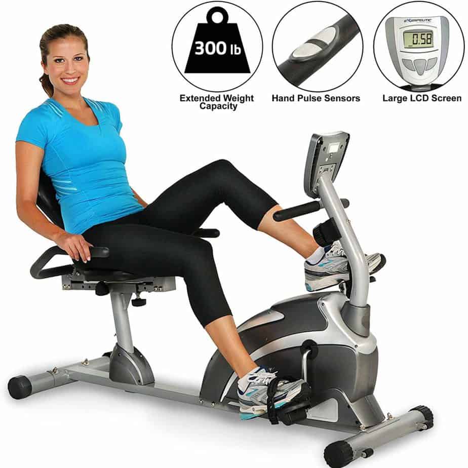 A lady is riding on the Exerpeutic 900XL Magnetic Recumbent Bike Pulse