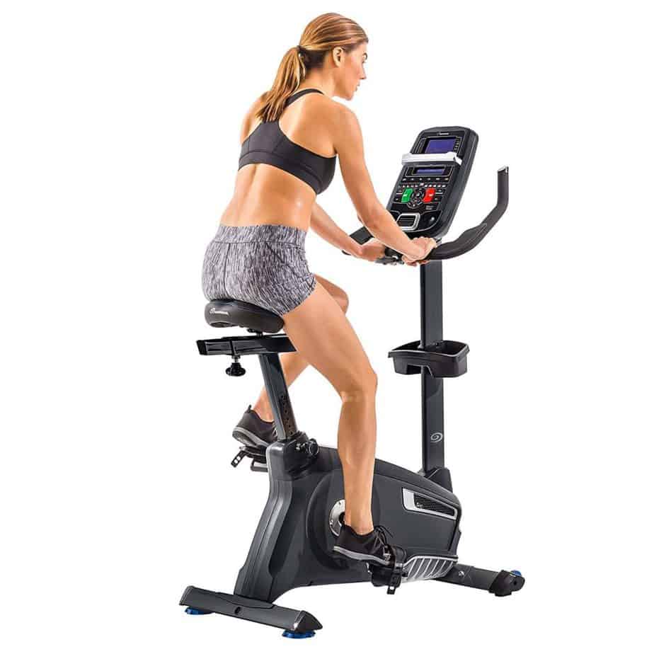 Nautilus U618 Upright Bike (Model 100653) is ridden by a female athlete