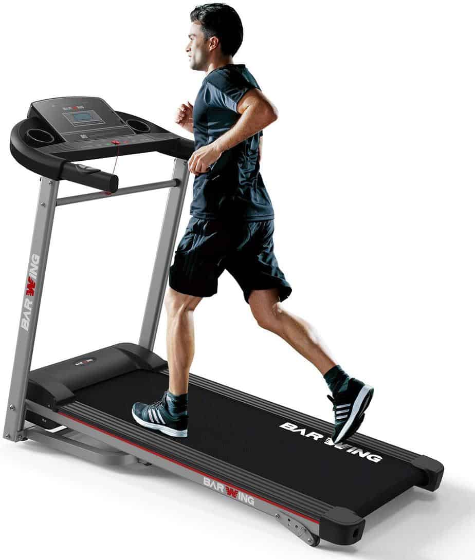 A man is running on the BARWING Electric Folding Treadmill