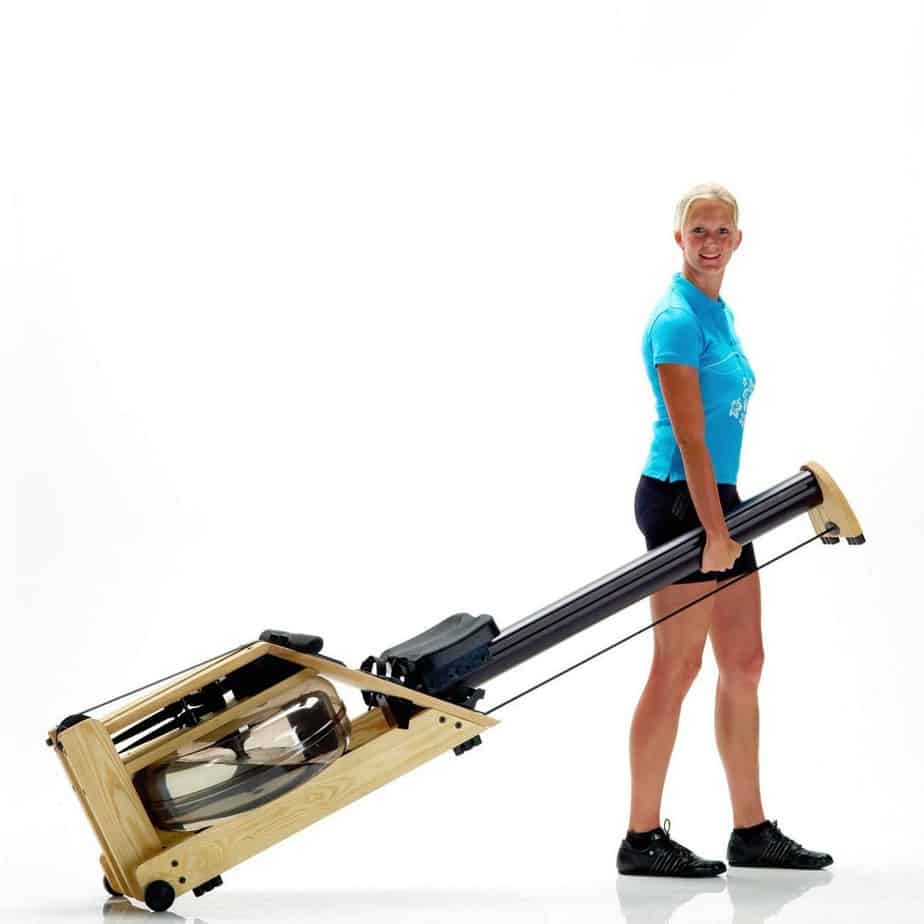 A lady moving the Waterrower A1 Studio Rowing Machine