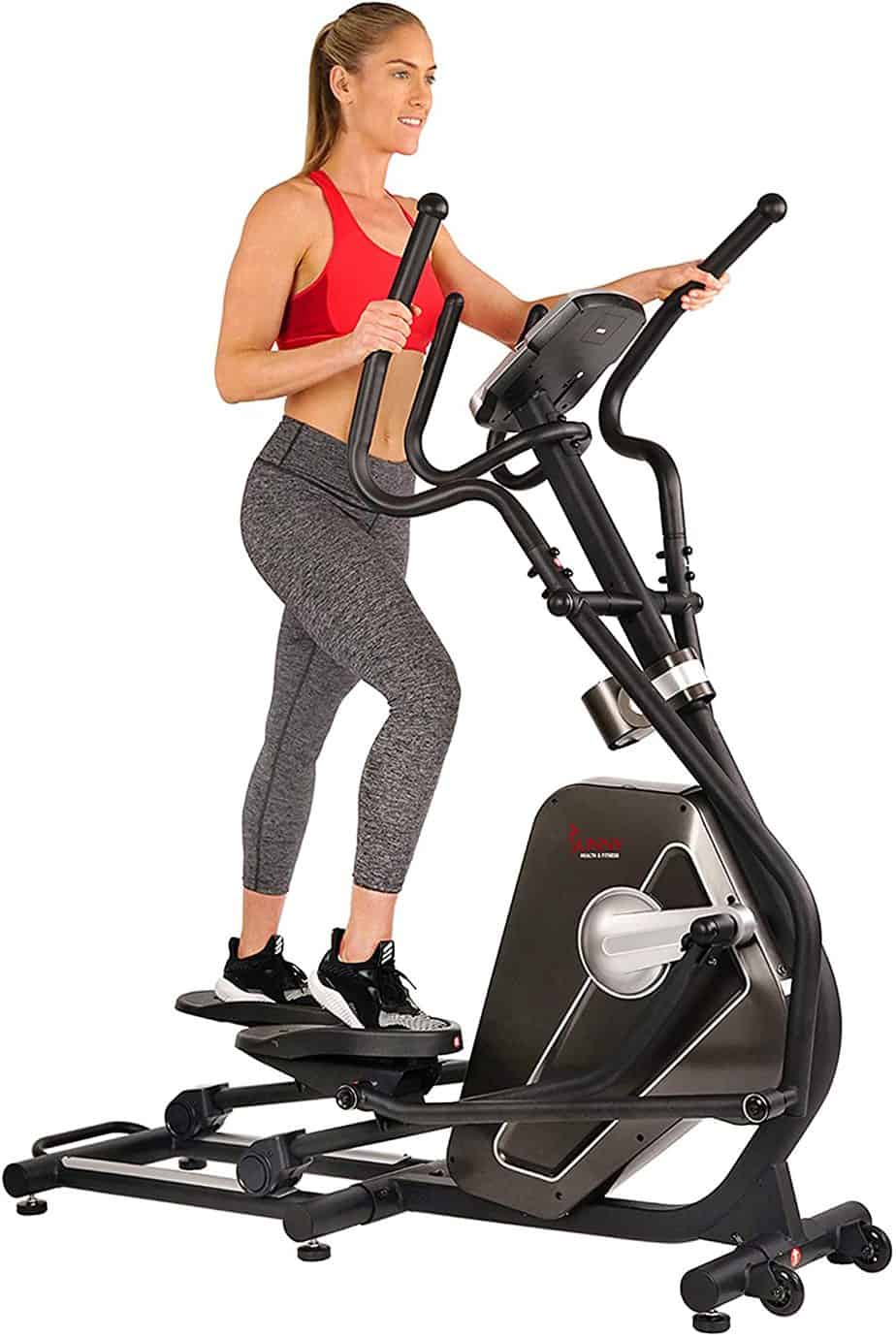 A lady is working out with the Sunny Health and Fitness SF-3862 Elliptical
