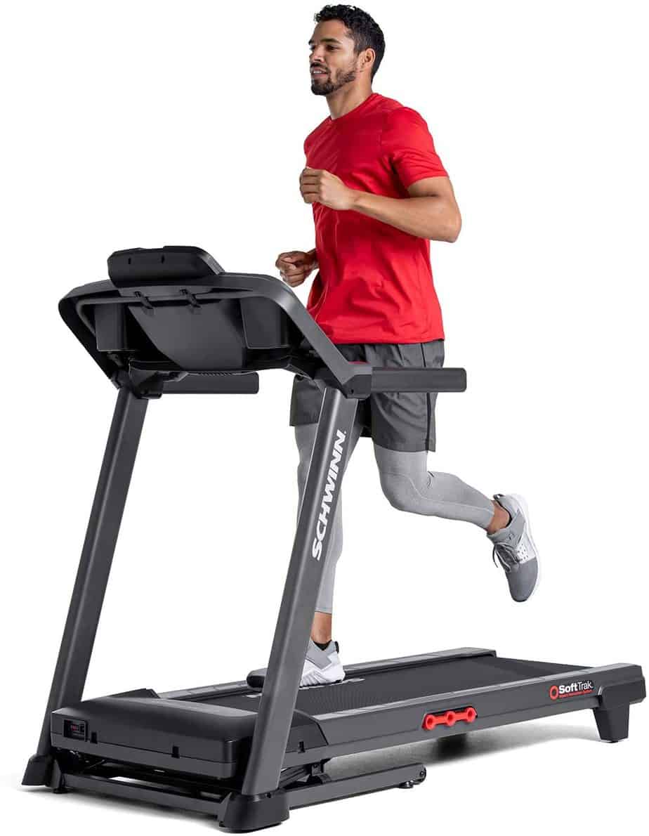 A man is running on the Schwinn 810 Treadmill Model 100799
