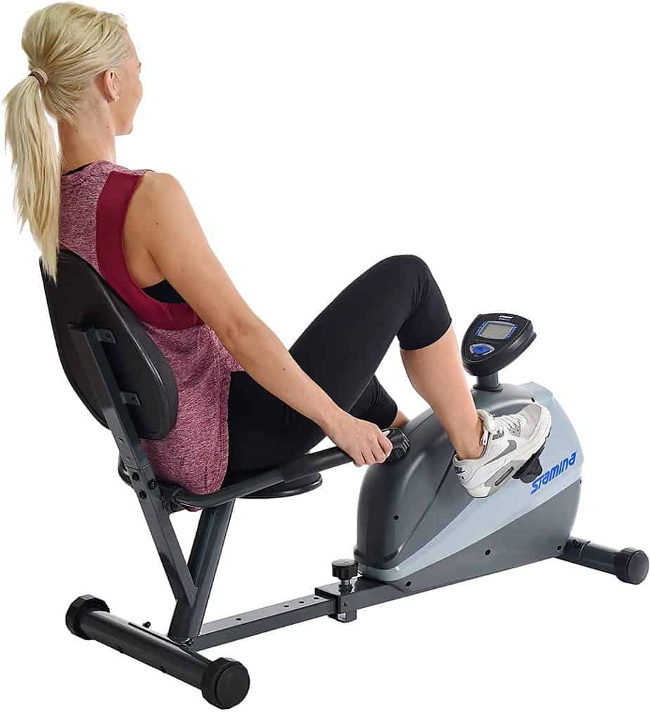 The Stamina 4831 Magnetic Recumbent is being ridden by a lady