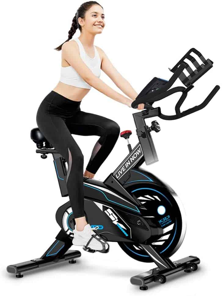 A lady is riding the L NOW 582 (S2) Indoor Exercise Bike