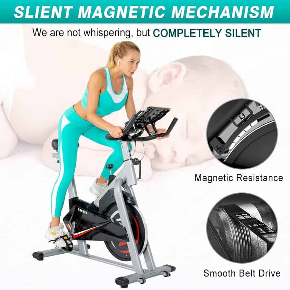 A lady is exercising with the SUPAKA Indoor Magnetic Spin Bike