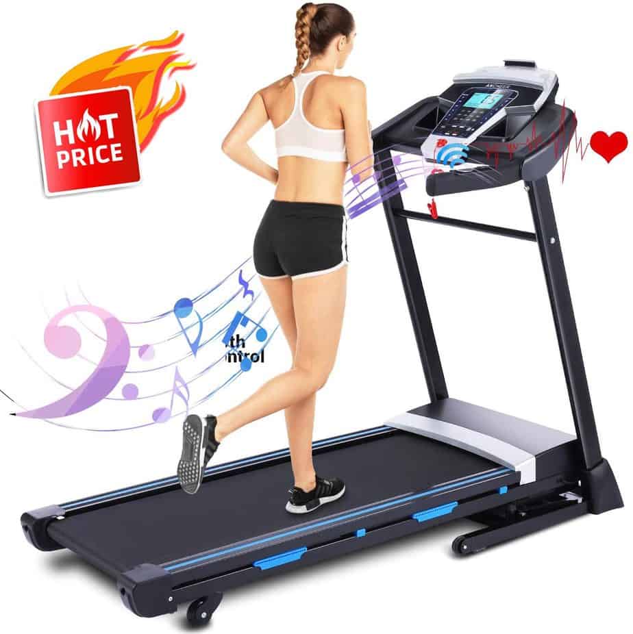 A lady jogs on the FUNMILY 3.25 HP Model T900 Folding Treadmill