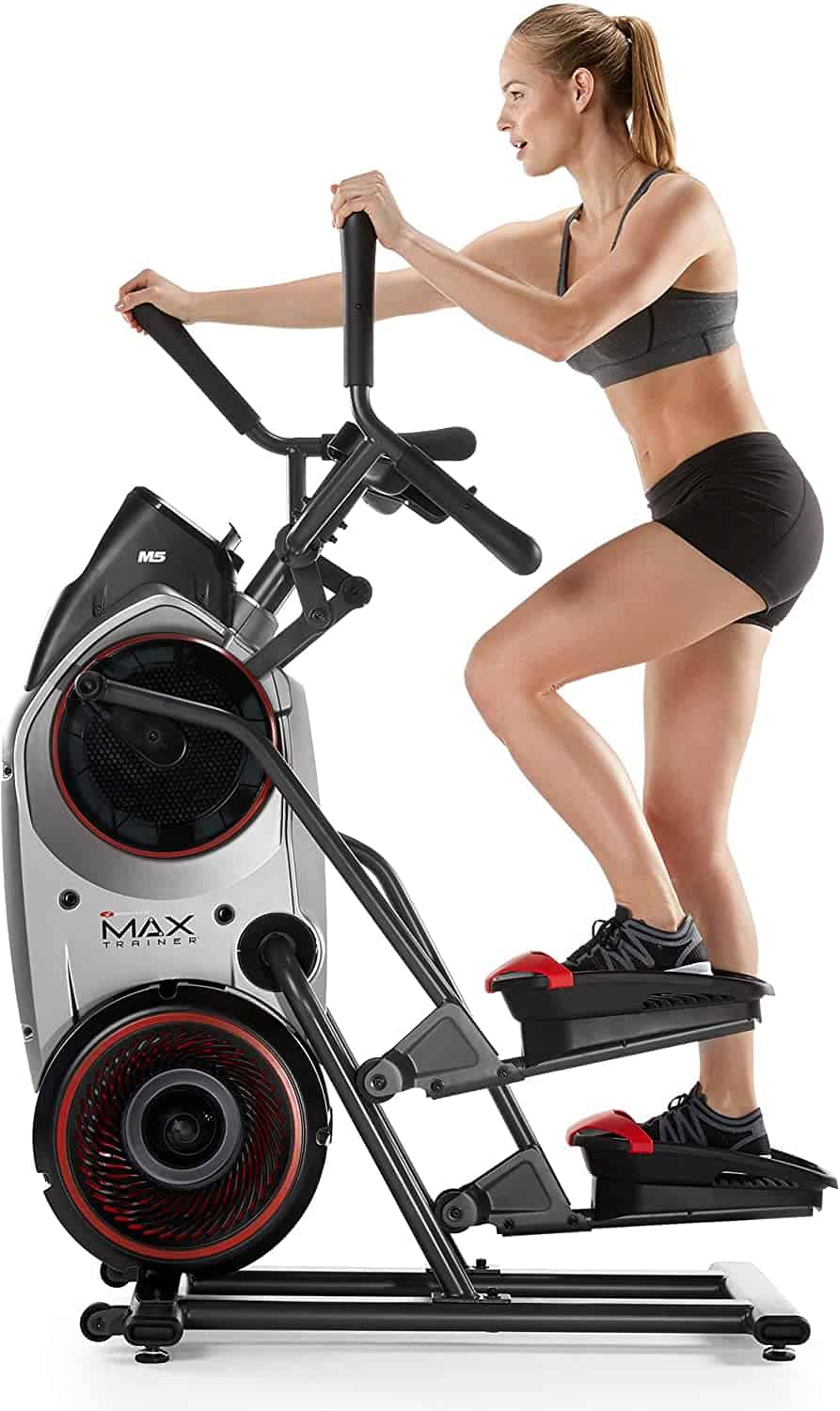 A lady exercises with the Bowflex Max Trainer M5