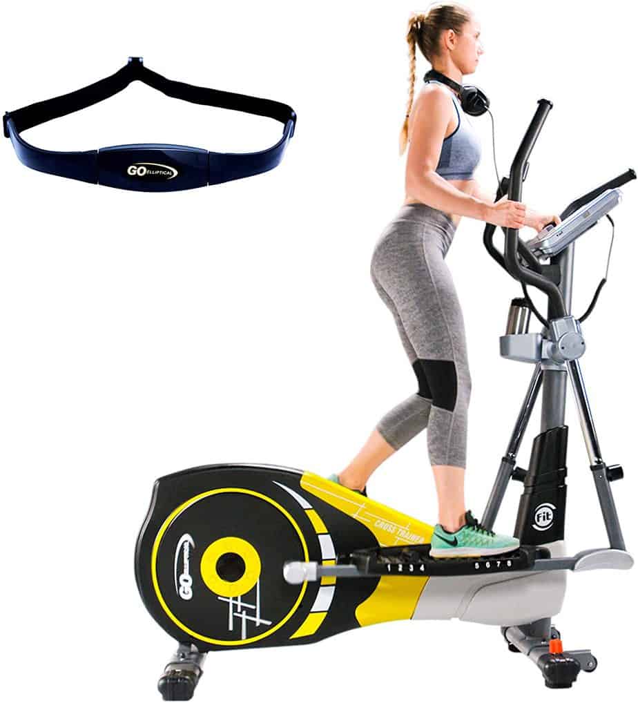 A lady exercises with the GOELLIPTICAL V-600X Elliptical Cross Trainer while HR rate chest strap is in display