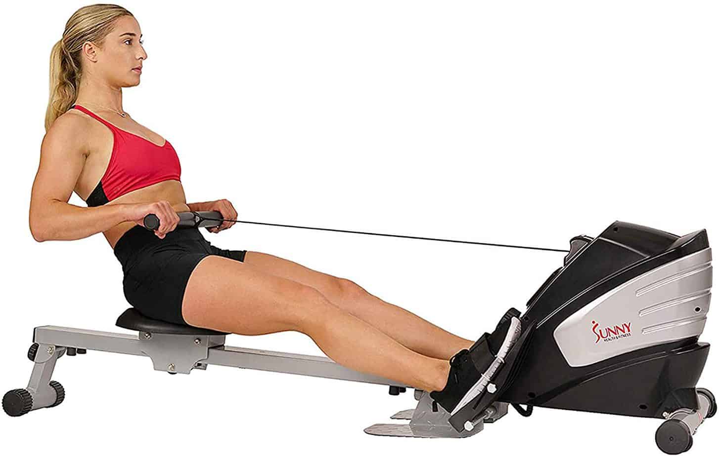 The Sunny Health & Fitness SF-RW5622 Magnetic Rowing Machine is being used by a lady
