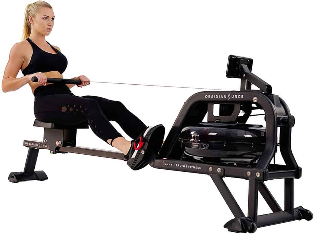 A lady exercises with the Sunny Health & Fitness SF-RW5713 Obsidian Surge 500 Rowing Machine