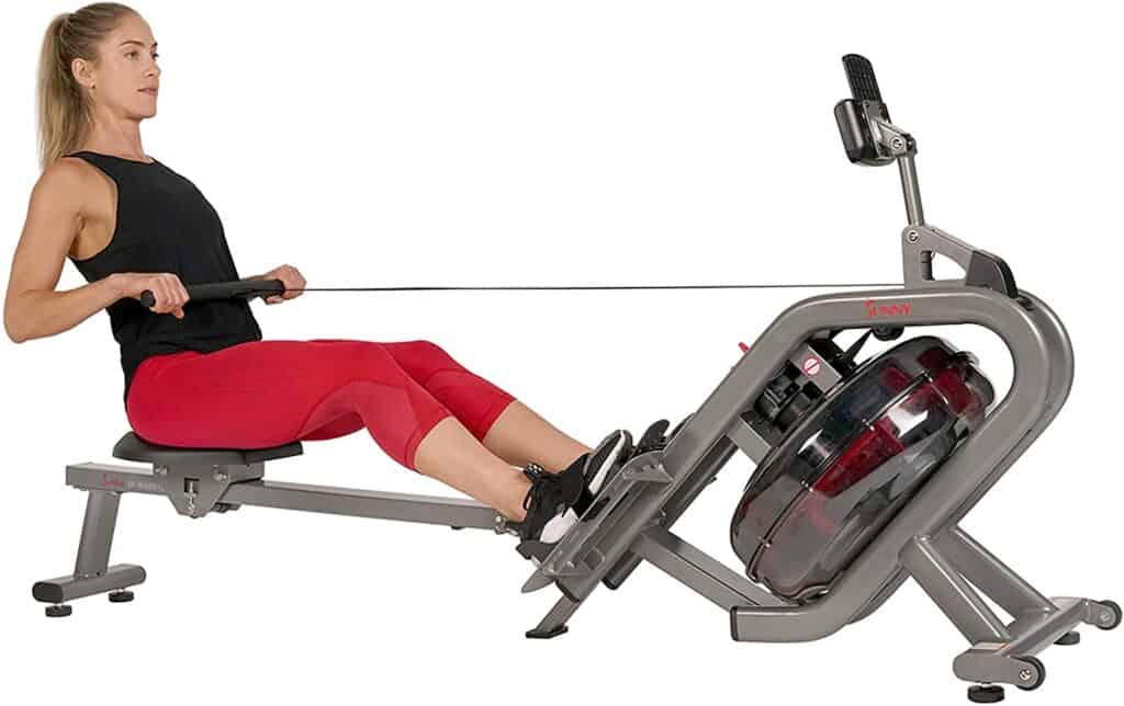 This woman uses the Sunny Health & Fitness SF-RW5910 Phantom Hydro Water Rower