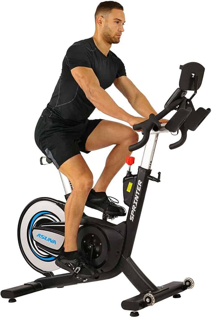A man rides the Sunny Health & Fitness Asuna Sprinter 6100 Cycling Bike