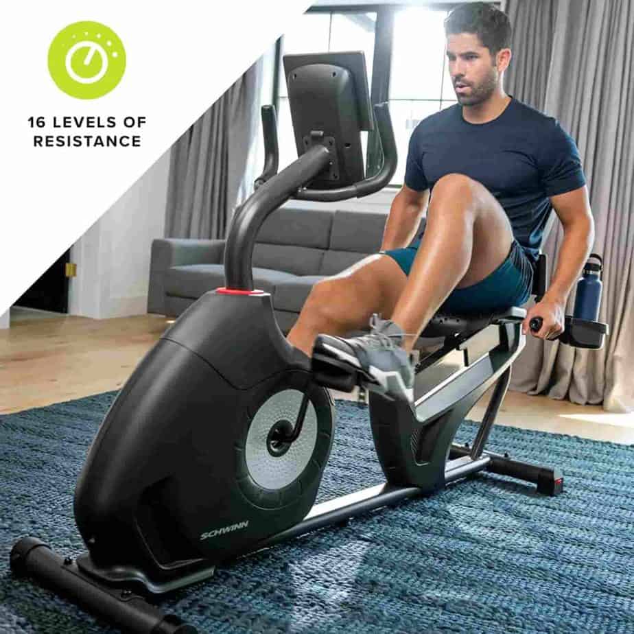 A man exercises with the Schwinn 230 (MY20) Recumbent Bike