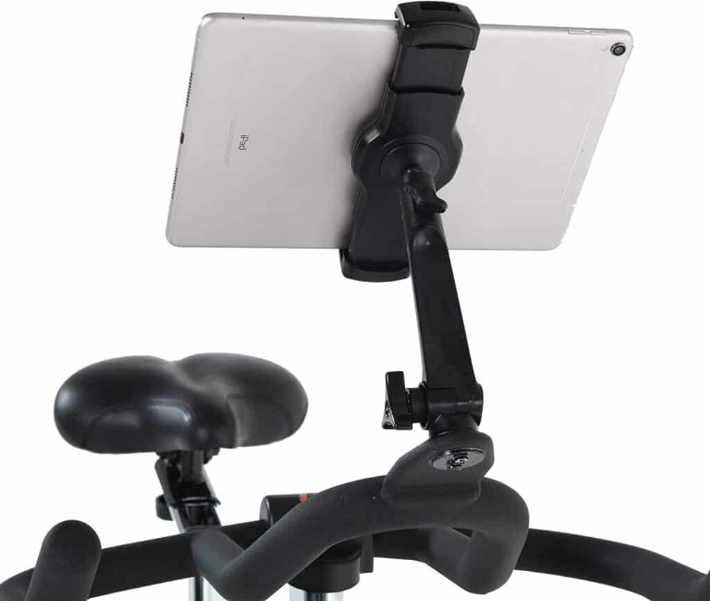 The retractable device holder on the Women’s Health Men’s Health Eclipse Indoor Cycling Bike 