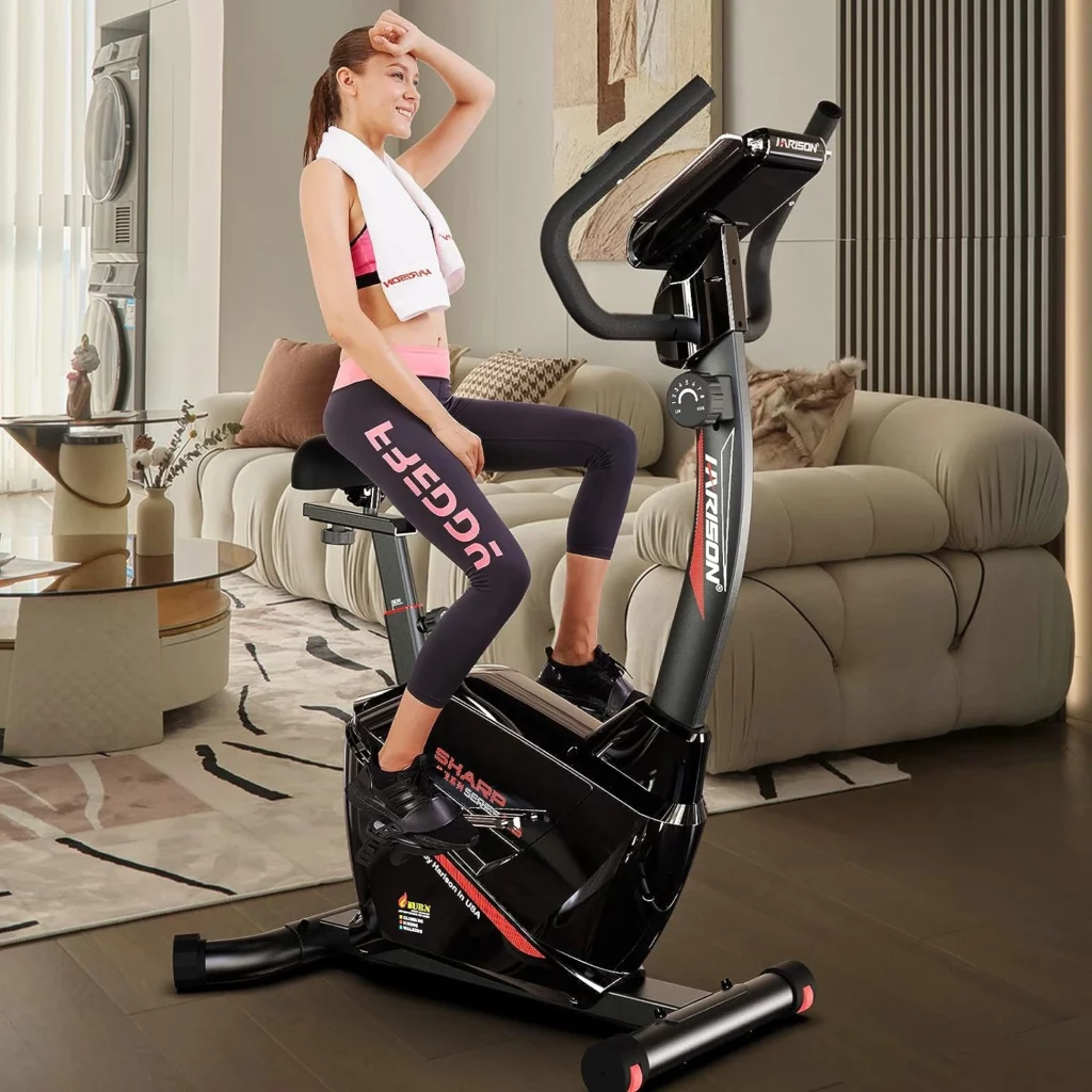 A lady exercises on the Harison B6 Upright Exercise Bike