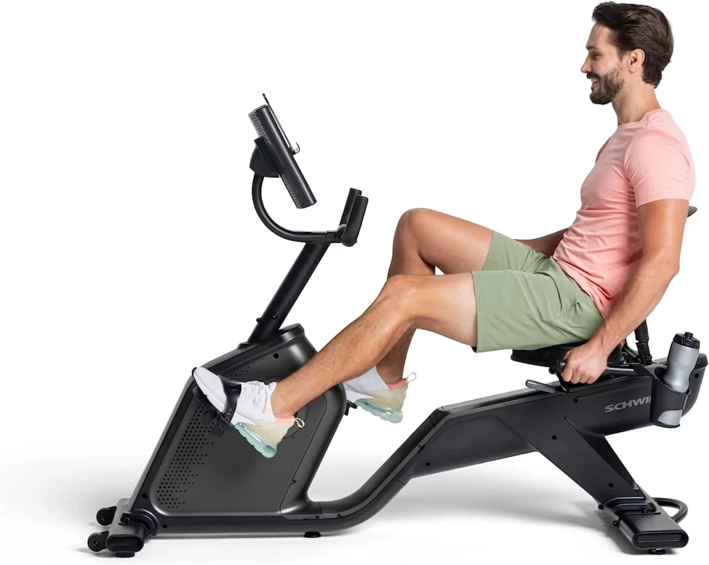 A man exercises on the Schwinn 290 Recumbent Bike