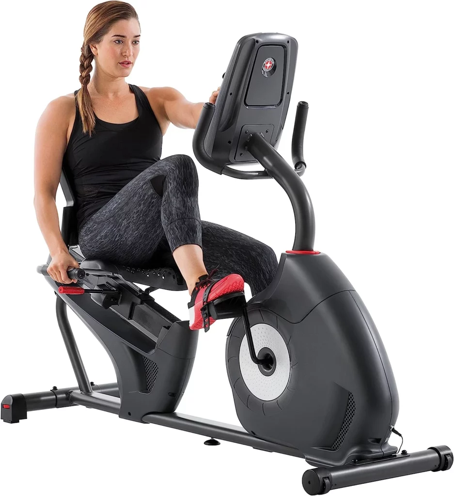 A woman exercises with the Schwinn 230 Recumbent Bike (MY16)