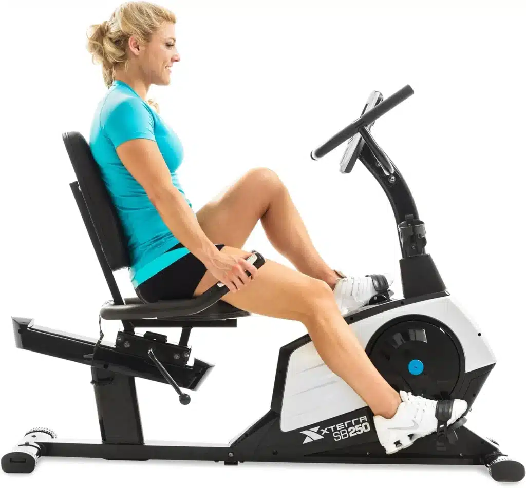 A lady exercises on on the XTERRA Fitness SB250 Recumbent Bike